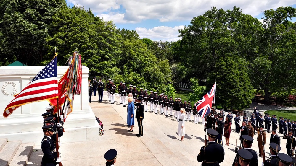 Britain's King Charles III and Queen Camilla, accompanied by Maj. Gen. Antoinette Gant, commanding general of the Joint Task Force-National Capital Region and the U.S. Army Military District of Washington, and Chief of Protocol Monica Crowley, lay a wreath at the Tomb of the Unknown Solider at Arlington National Cemetery in Arlington, Va., Thursday, April 30, 2026.