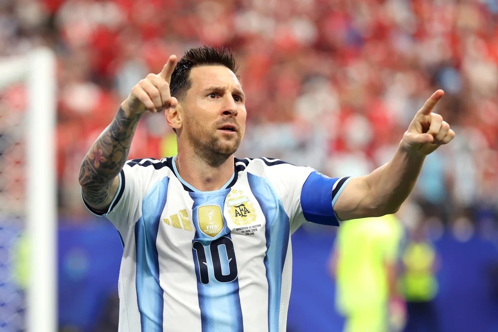 Lionel Messi celebrates after scoring his team's first goal against Austria
