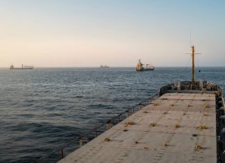US Strikes Iran Targets After Attack on Commercial Ship Near Strait of Hormuz Oil tankers and cargo vessels are anchored off the coast of Oman on June 23.