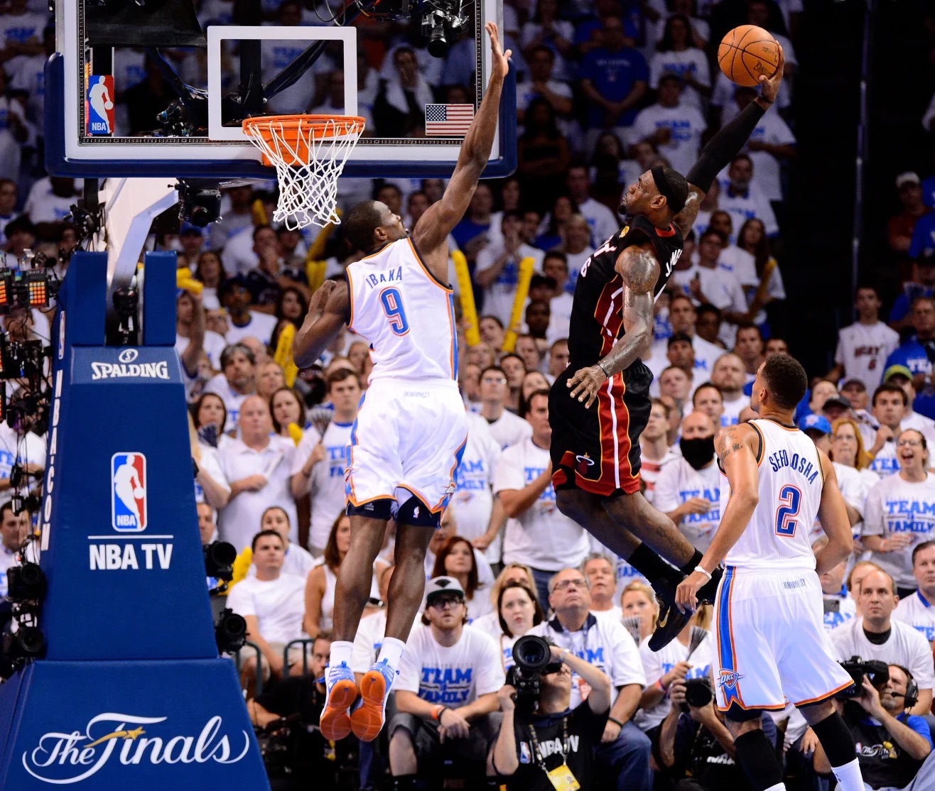 James dunks over 