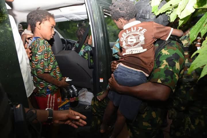 Rescued Oriire pupils are helped into a waiting vehicle by security personnel after their release in Oyo State in July 2026. |