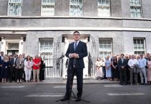 Andy Burnham Becomes British Prime Minister, Promising Stability, and 10-Year Plan British Prime Minister Andy Burnham delivers his first remarks outside 10 Downing Street after taking office in London on July 20, 2026. | Thomas Krych/AP