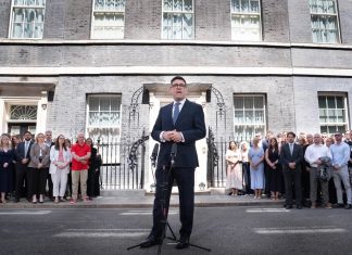 Andy Burnham Becomes British Prime Minister, Promising Stability, and 10-Year Plan British Prime Minister Andy Burnham delivers his first remarks outside 10 Downing Street after taking office in London on July 20, 2026. | Thomas Krych/AP