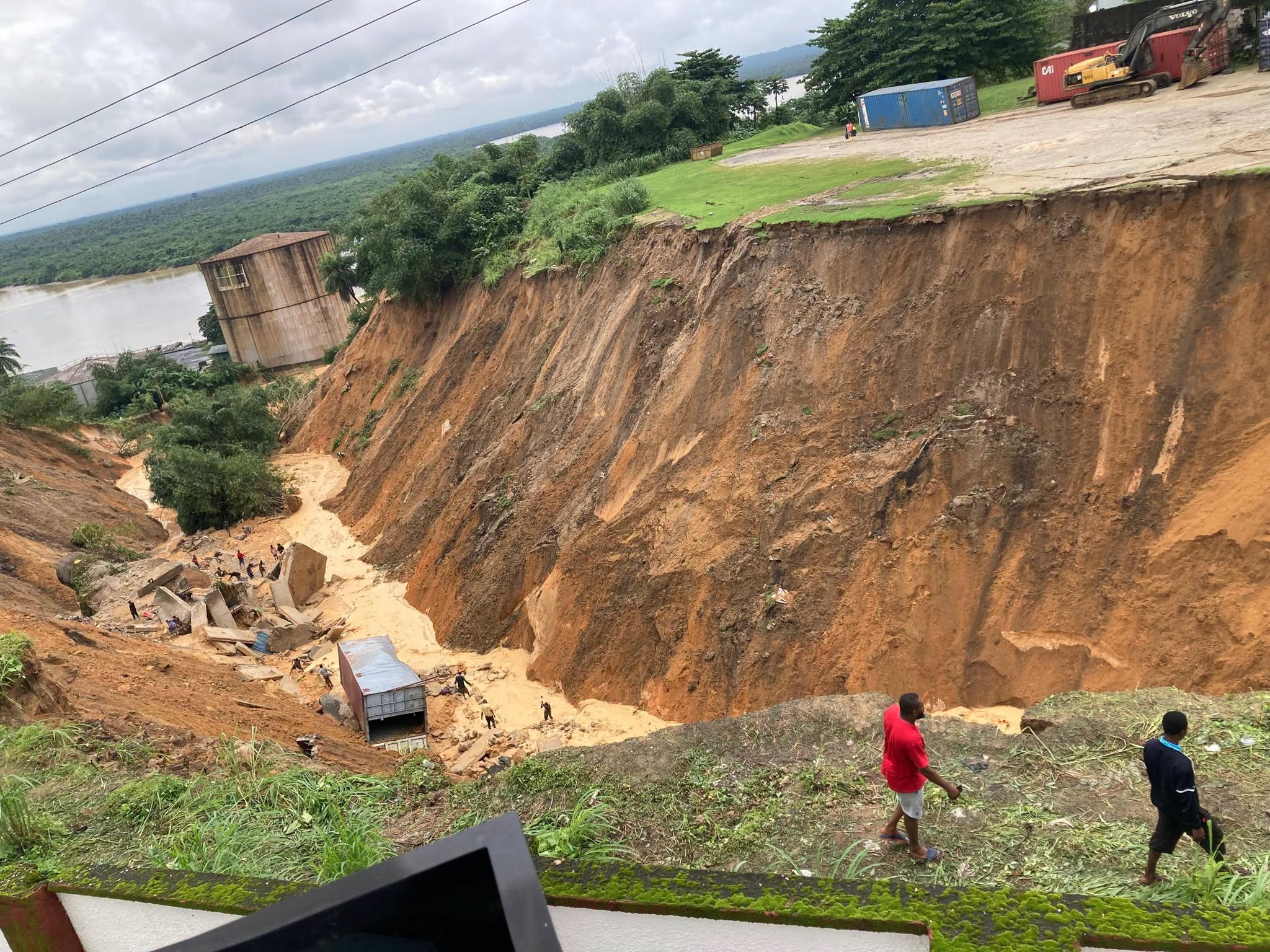 A section of Anansa Road in Calabar, Cross River State, is seen after a landslide triggered by persistent rainfall damaged the waterfront