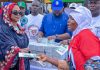 Nasarawa APC Governorship Candidate’s Wife’s Cash Distribution Raises Naira Abuse Concerns Hajiya Maryam Wadada, wife of Nasarawa APC governorship candidate Senator Ahmed Wadada, appears to hand cash to a woman during the launch of the Hajiya Maryam Ahmed Wadada Aliyu Women Empowerment Scheme in Lafia, Nasarawa State, on August 10, 2026. | The Trent Illustration