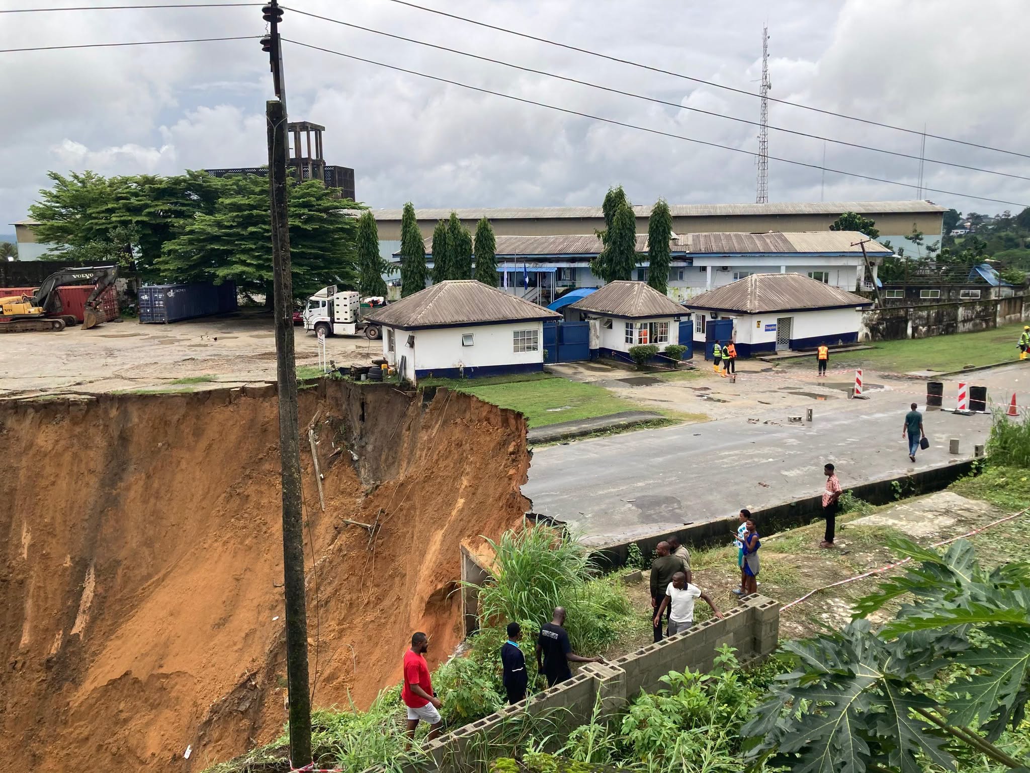 A section of Anansa Road in Calabar, Cross River State, is seen after a landslide triggered by persistent rainfall damaged the waterfront