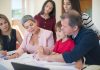 7 Essential Money Conversations Every Family Should Have Family having an open conversation about money and financial planning