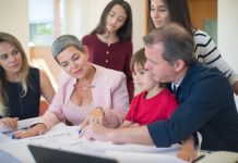 7 Essential Money Conversations Every Family Should Have Family having an open conversation about money and financial planning