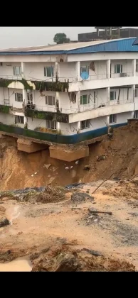 A section of UNICEM Clinic collapses after a landslide triggered by persistent rainfall worsened along Anansa Road in Calabar, Cross River State, in August 2026. | Screengrab from Video