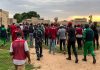 Kano Community Rejects Alleged ₦10 Million Bride from Alleged Drug Pushers Illustration of Kano residents and security agents at the scene of the arrest. | The Trent