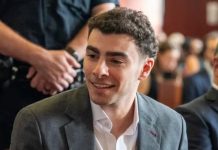 Luigi Mangione Returns to Court as Judge Orders Anonymous Jury for September Murder Trial Luigi Mangione speaks with his lawyers during a pretrial hearing in his murder case in