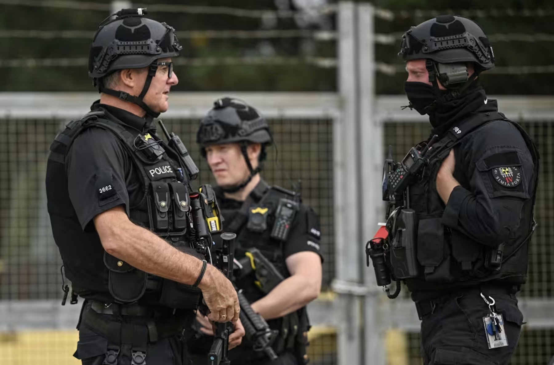 Police stationed at an entrance to RAF Fairford on Sunday,