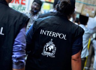 6 Nigerian Men Accused of $6 Million Romance Scheme to Face US Charges INTERPOL officers are pictured in a file image accompanying the agency’s announcement of Operation HAECHI-I, an online financial crime operation across