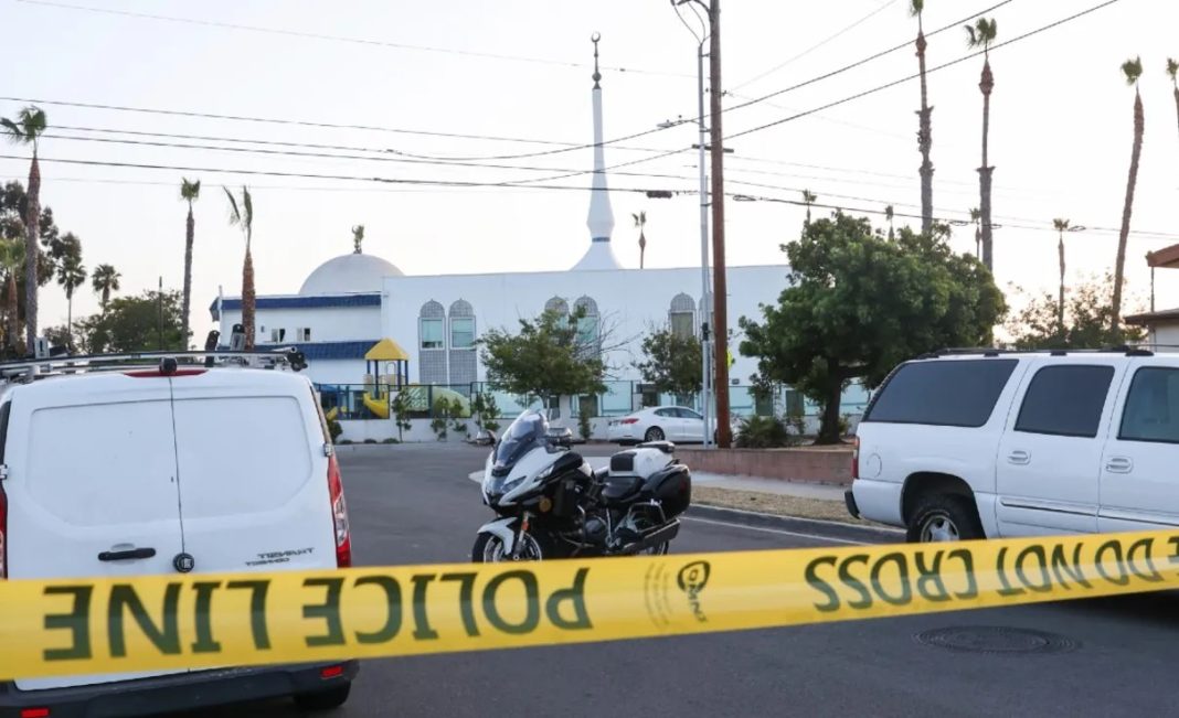 Police tape cordons off the scene around the Islamic Center of San Diego after the shooting on May 19, 2026.