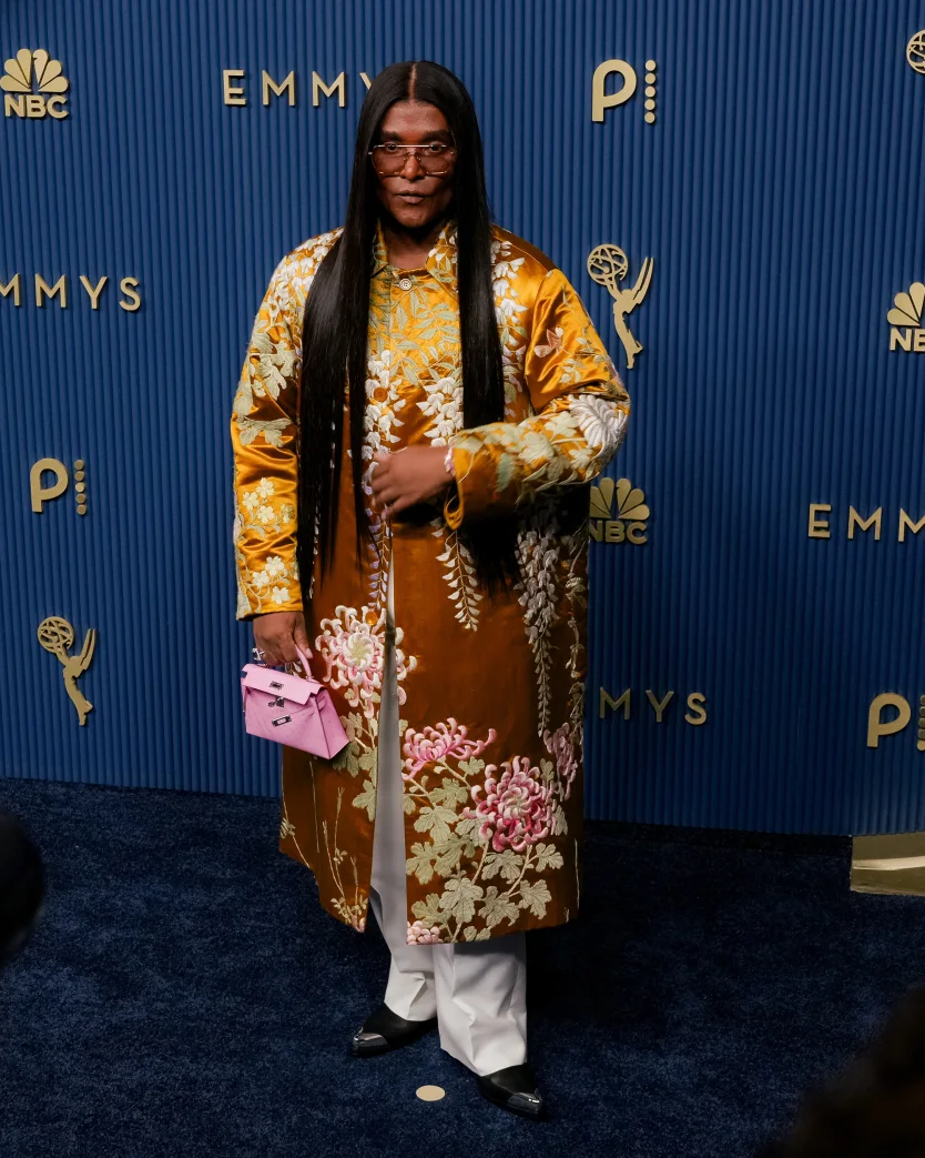 Zendaya’s long-time stylist Law Roach in an ornate embroidered outfit by Givenchy. 
