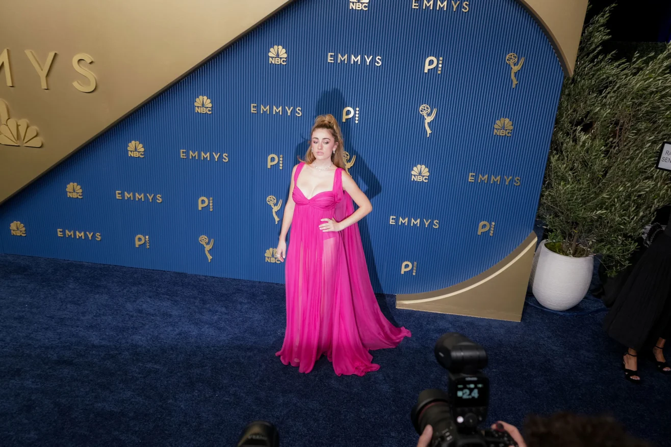 Rachel Sennott attends the 78th Primetime Emmy Awards at the Peacock Theater in Los Angeles on September 14, 2026, wearing a fuchsia custom Balenciaga gown. | 
