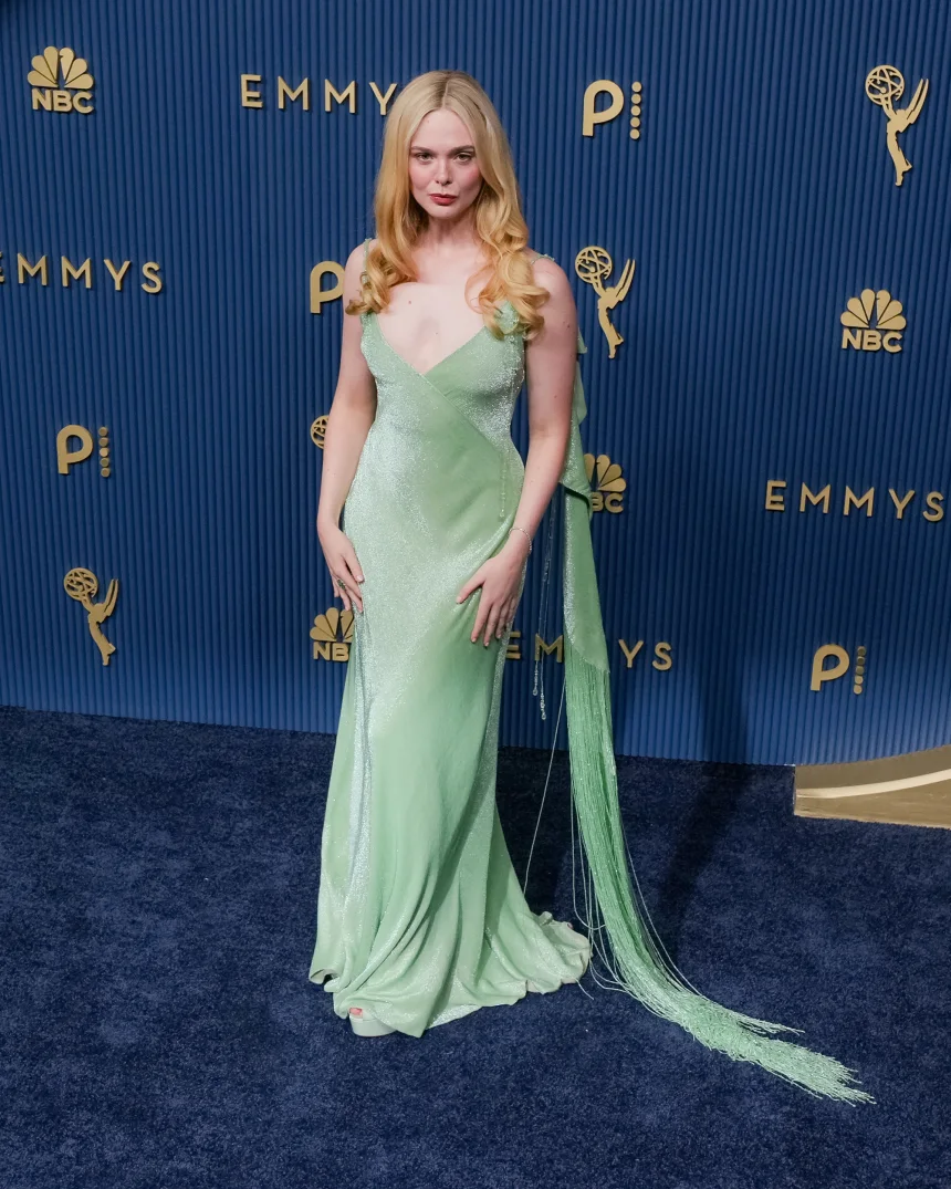 Elle Fanning attends the 78th Primetime Emmy Awards at the Peacock Theater in Los Angeles on September 14, 2026, wearing a custom jade Ralph Lauren gown made from embroidered silk chiffon. 