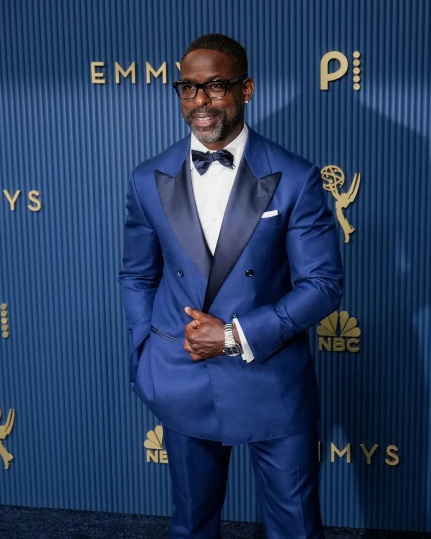 Sterling K. Brown attends the 78th Primetime Emmy Awards at the Peacock Theater in Los Angeles on September 14, 2026, wearing a cobalt-blue Brunello Cucinelli tuxedo. | 