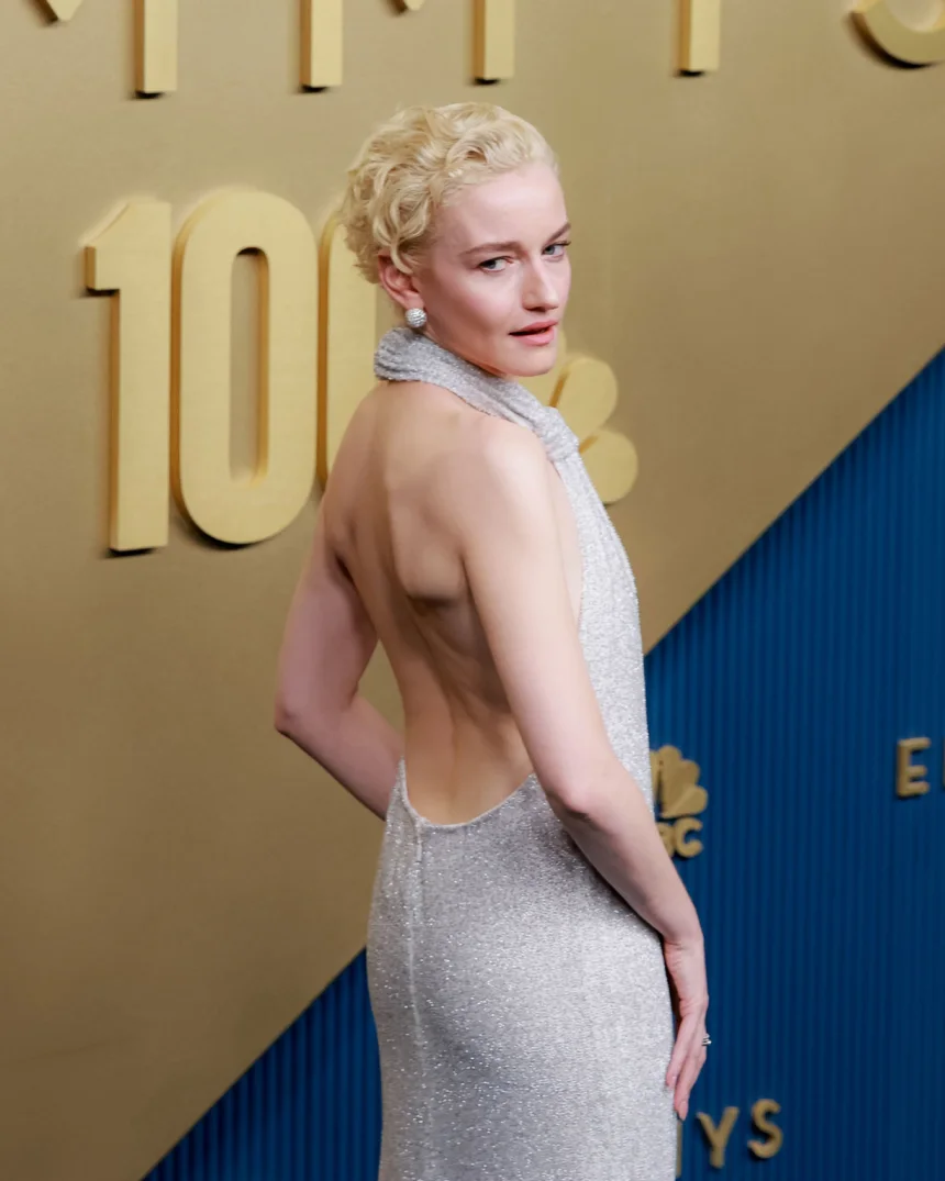 Julia Garner attends the 78th Primetime Emmy Awards at the Peacock Theater in Los Angeles on September 14, 2026, wearing a backless halterneck Loewe gown covered in intricate caviar beadwork. | Jennelle Fong for CNN