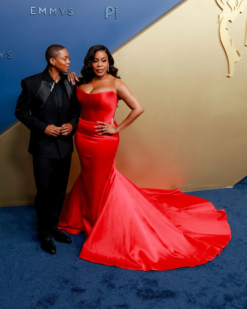 Musician Jessica Betts, left, in Alexander McQueen, and actor Niecy Nash-Betts, in Khaled and Marwan, attend the 78th Primetime Emmy Awards at the Peacock Theater in Los Angeles on September 14, 2026. | Jennelle Fong for CNN