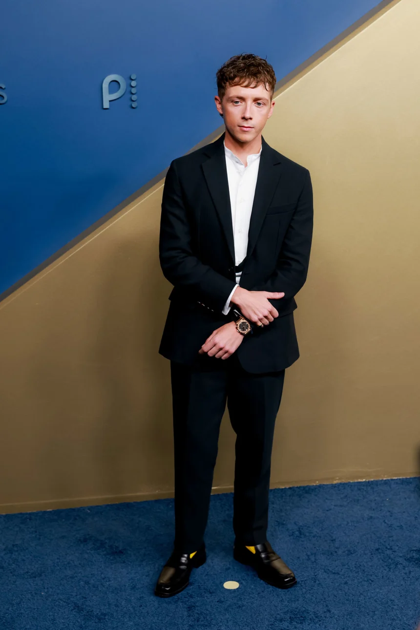 LOS ANGELES, CALIFORNIA – SEPTEMBER 14: “The Pitt” star Gerran Howell attends the 78th Primetime Emmy Awards at the Peacock Theater on Monday, September 14, 2026, wearing a dark Fendi suit with a white band-collar shirt. | Jennelle Fong for CNN