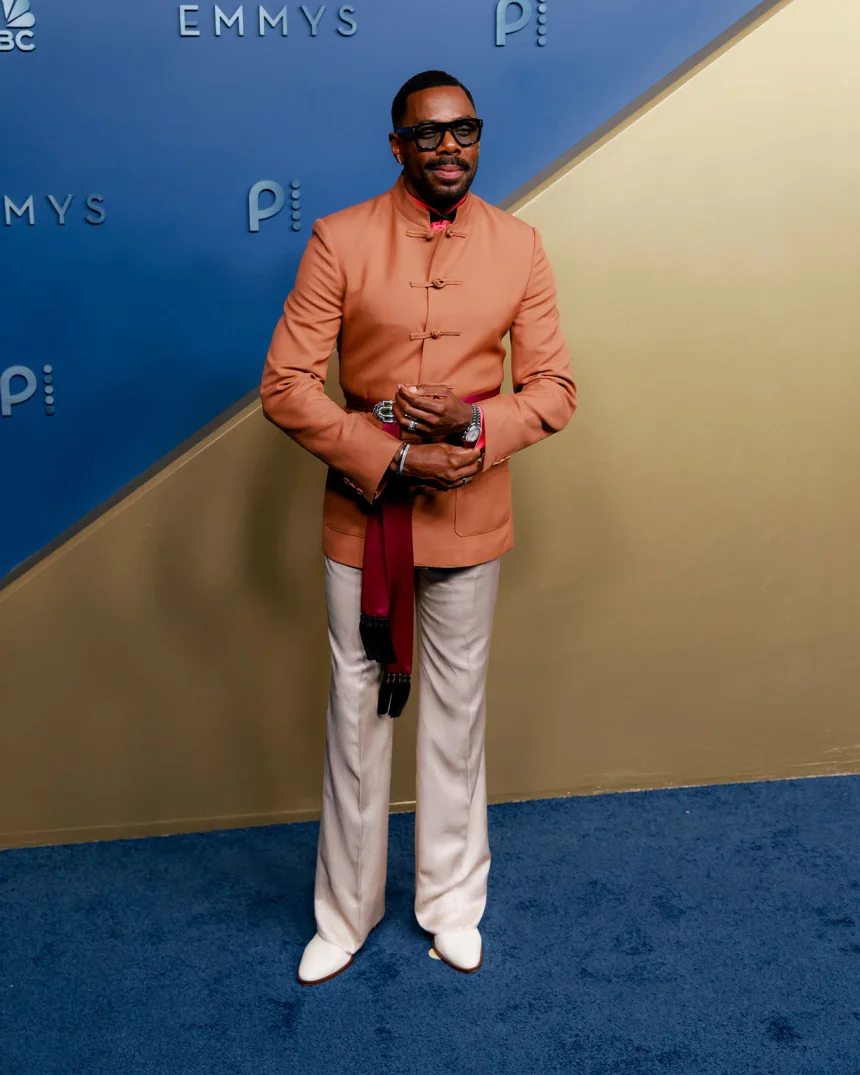 LOS ANGELES, CALIFORNIA – SEPTEMBER 14: “The Four Seasons” star Colman Domingo attends the 78th Primetime Emmy Awards at the Peacock Theater on Monday, September 14, 2026, wearing a mandarin-collared copper jacket, cream trousers, and a magenta sash belt by Valentino. | Jennelle Fong for CNN