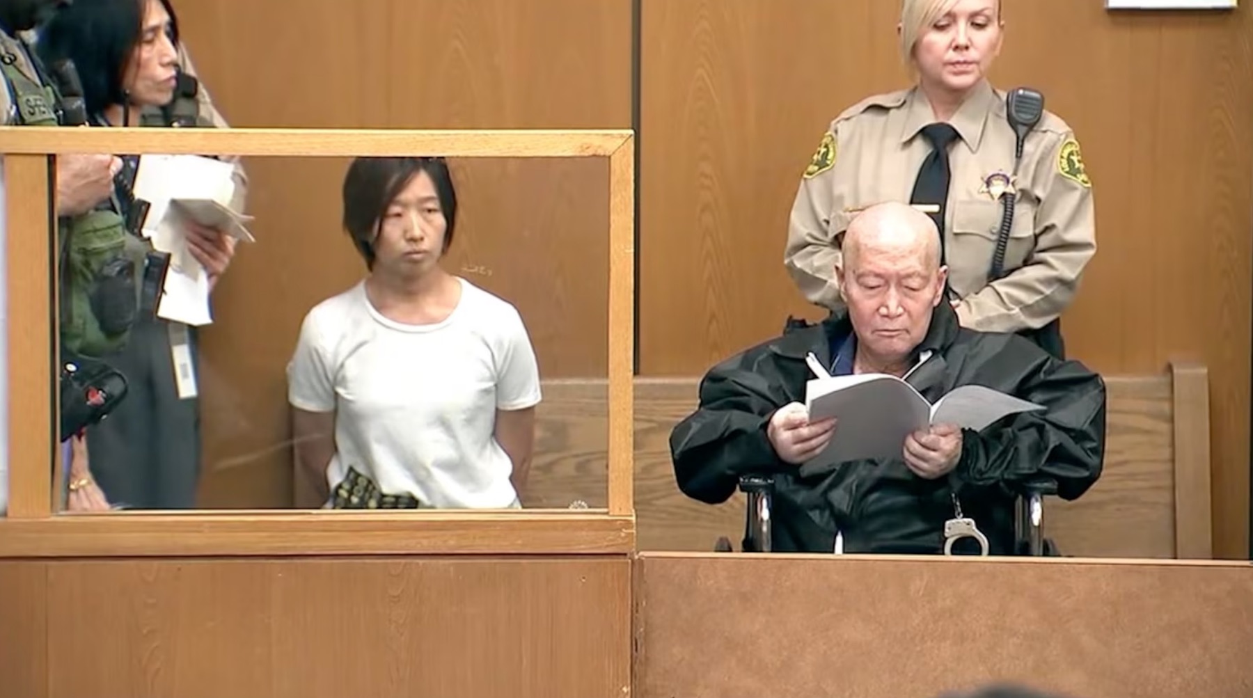 Silvia Zhang, left, and Guojun Xuan appear in a Los Angeles County courtroom for their arraignment, Oct. 6, 2026.