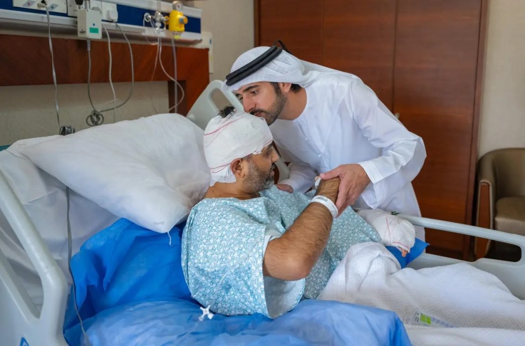 Dubai Crown Prince Sheikh Hamdan bin Mohammed bin Rashid Al Maktoum embraces injured flydubai pilot Captain Smit Machchhar during a hospital visit in Abu Dhabi on Saturday, October 3, 2026. | @HamdanMohammed/X/ANI Photo