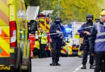 Two Iranian Nationals Charged in Alleged Manchester Terror Plot Armed police officers at the scene of an incident at Heaton Park Hebrew Congregation synagogue in Crumpsall (PA Wire)