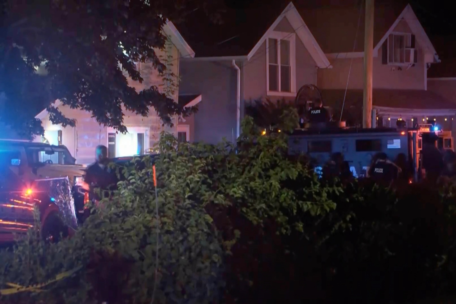 In this image from video provided by WJET, police gather outside the scene of a shooting in Erie, Pa., on Friday evening, Oct. 9, 2026. | Matt Barnum/WJET via AP