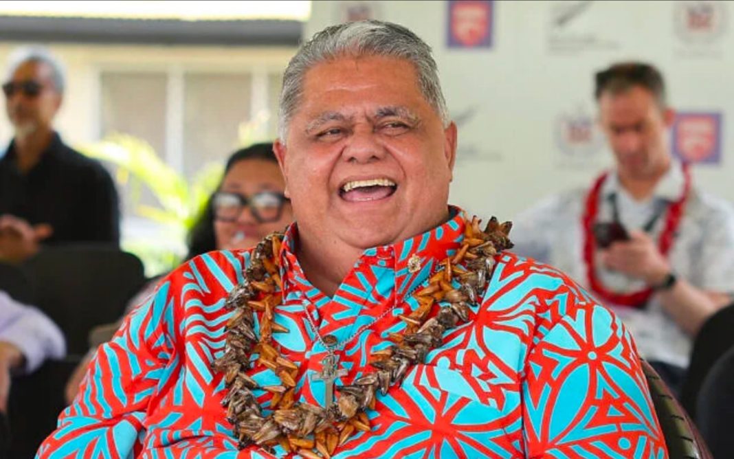 Samoan Prime Minister La’aulialemalietoa Leuatea Schmidt watches a rugby match between Auckland’s Tipene College and Samoa’s Wesley College with his New Zealand counterpart Christopher Luxon in the village of Faleula, Samoa, on March 17, 2026.