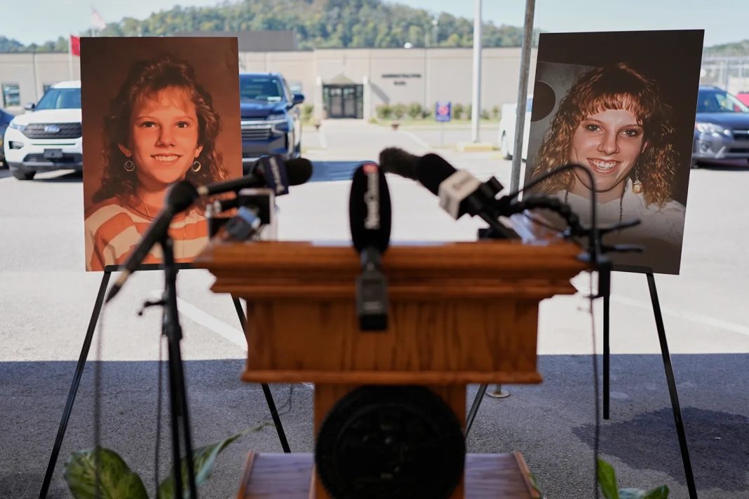 Photographs of Colleen Slemmer on display at a podium to address the press outside Riverbend