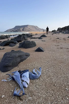 This image provided by the International Organization for Migration shows authorities intervening after a migrant ship capsized near Guhere, north of Obock, in Djibouti, Saturday, Oct. 11, 2026.