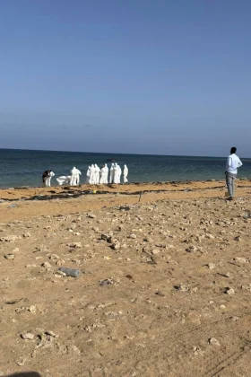 This image provided by the International Organization for Migration shows authorities intervening after a migrant ship capsized near Guhere, north of Obock, in Djibouti, Saturday, Oct. 11, 2026. |